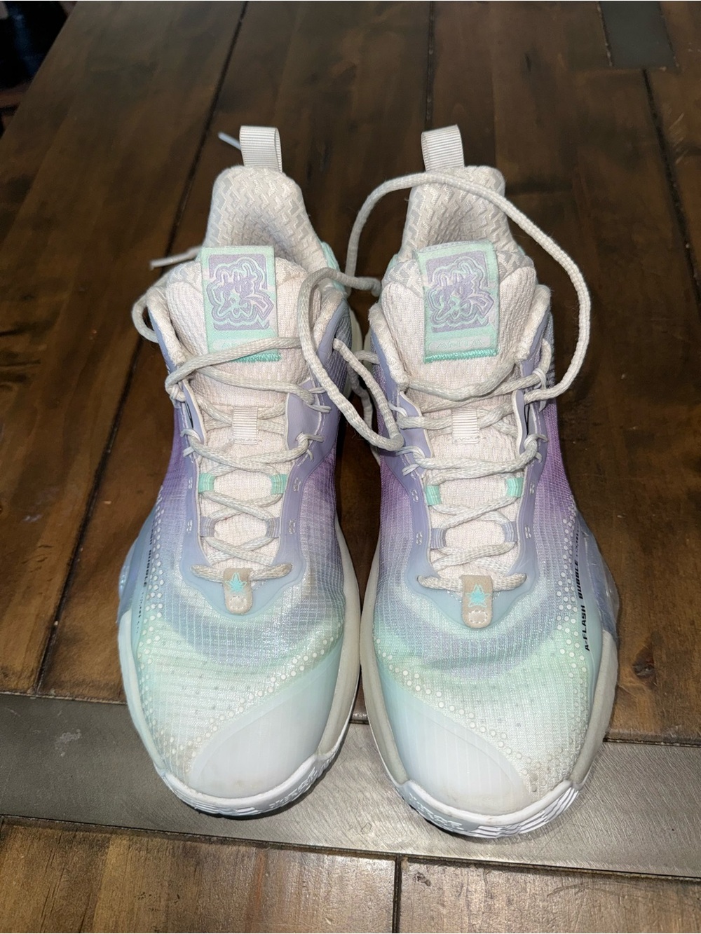 ANTA Bubble Bomb sneakers in a white, blue, and purple colorway.